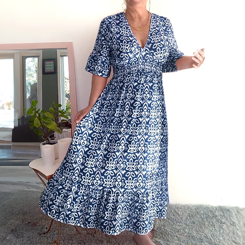 🔥Vendita calda - 50% DI SCONTO🔥Abito lungo avvolgente in vita con scollo a V e stampa casual bohémien