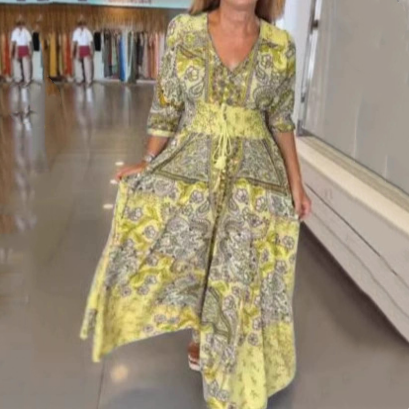 Abito lungo elegante con stampa floreale e cordoncino da donna