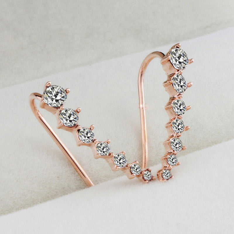 Orecchino con sette stelle e diamanti