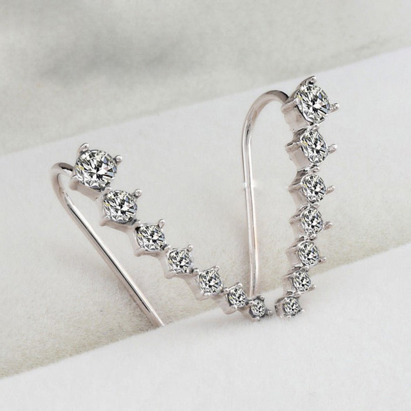 Orecchino con sette stelle e diamanti