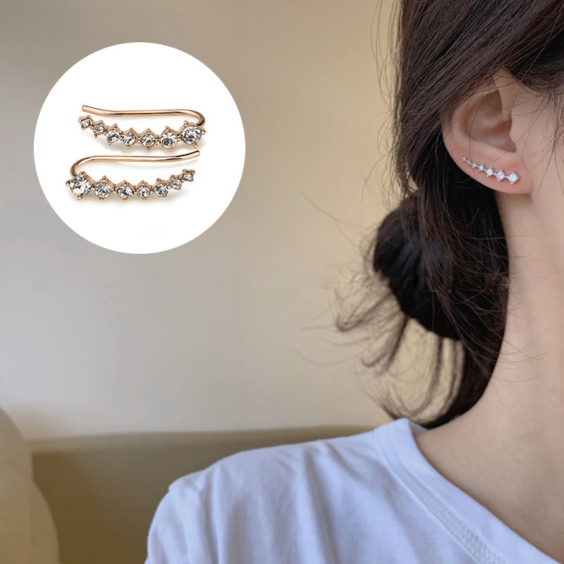 Orecchino con sette stelle e diamanti