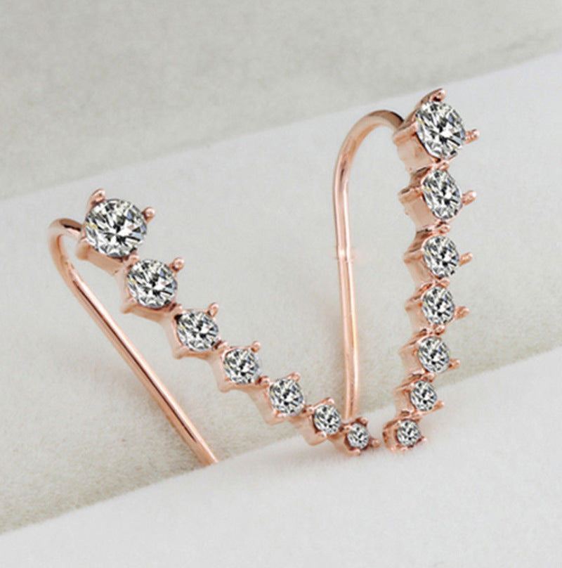 Orecchino con sette stelle e diamanti