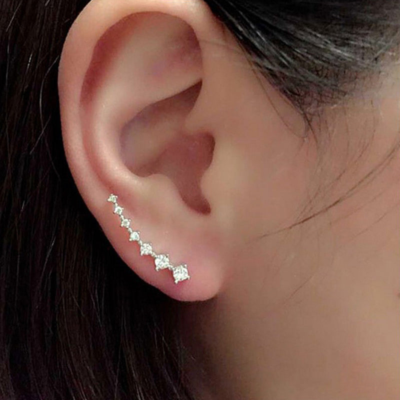 Orecchino con sette stelle e diamanti