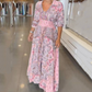 Abito lungo elegante con stampa floreale e cordoncino da donna