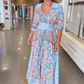 Abito lungo elegante con stampa floreale e cordoncino da donna
