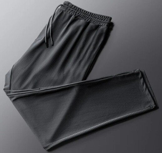 Pantaloni elasticizzati da uomo per l'allenamento e la corsa